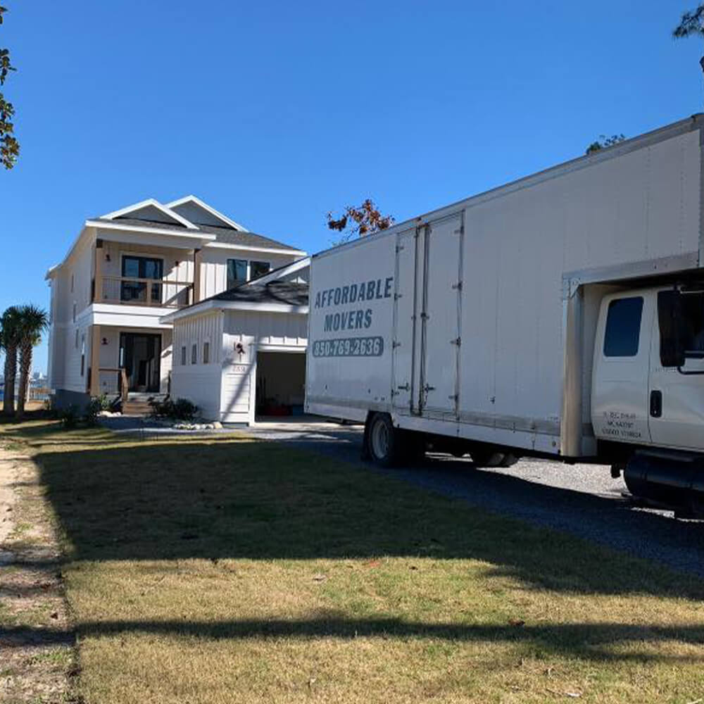 Affordable Movers Truck pasrked in driveway